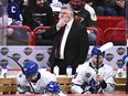 Maple Leafs coach ponders his next move behind the Leafs bench. GETTY FILE