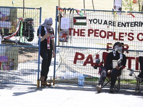A pro-Palestinian encampment is seen inside the fenced off section of King's College Circle at the University of Toronto, Friday, May 24, 2024.