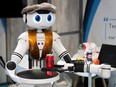 The waiter robot ONYRO of the Ipsum Tek French company is displayed during the 8th edition of the Vivatech technology startups and innovation fair, at the Porte de Versailles exhibition centre in Paris, Thursday, May 23, 2024.