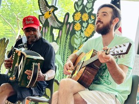 Jeffery Broussard and Ethan Moody perform traditional Zydeco music at the St. Landry Parish Visitors Centre. (EDDIE CHAU/Toronto Sun)