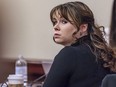 Hannah Gutierrez-Reed, the former armorer at the movie "Rust," listens to closing arguments in her trial at district court, Wednesday, March 6, 2024, in Santa Fe, N.M.