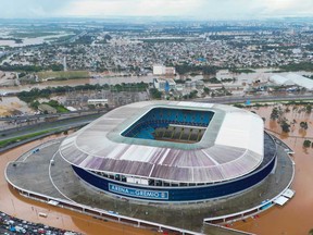 In this aerial view, flood waters surround the Gremio Arena after heavy rain on May 5, 2024 in Porto Alegre, Brazil.