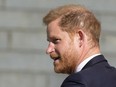 Prince Harry looks round as he arrives at St Paul's Cathedral for a 'Service of Thanksgiving' celebrating 10 years of the Invictus Games Foundation, in London, Wednesday, May 8, 2024.
