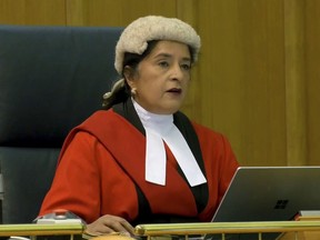 This screen grab taken from PA Video shows judge Mrs Justice Cheema-Grubb, during a live broadcast from Teesside Crown Court, sentencing Moroccan asylum seeker Ahmed Alid, 45, who was found guilty of murdering Terence Carney, attempting to murder his own housemate and assaulting two police officers, to life with a minimum term of 45 years, at the court in London, Friday May 17, 2024.