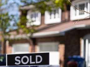 The Canadian Real Estate Association says the number of home sales in April rose 10.1 per cent compared with a year ago, but attributed the gain primarily to the early Easter long weekend. A real estate sign is posted outside a home in Pointe-Claire, a city in Montreal's West Island, Tuesday, May 7, 2024.