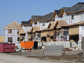 Canada Mortgage and Housing Corp. says the annual pace of housing starts in April edged down one per cent compared with March. A new housing development is shown in Belleville, Ont., on Friday, March 1, 2024.
