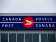 The Canada Post logo is seen in Richmond, B.C.