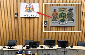 A sign created by city staff with the new Toronto coat of arms to fit the space left by the removed Etobicoke symbol