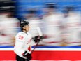 Canada's Connor Bedard celebrates with teammates after scoring his sides fourth goal during the preliminary round match between Great Britain and Canada at the Ice Hockey World Championships in Prague, Czech Republic, Saturday, May 11, 2024.