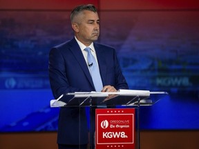 Nathan Vasquez responds to Multnomah County District Attorney Mike Schmidt, not seen, during a candidate debate hosted by The Oregonian and KGW news at KGW's studio the evening of Thursday., May 2, 2024 in Portland, Ore.