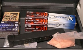 Auto Cargo Theft Unit officers seized loaded handgun, ammunition, prohibited firearm magazines, a pink substance believed to be fentanyl, and numerous fraudulent documents during the execution of a search warrant in Brampton on Thursday, May 9, 2024.