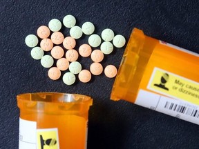 Hydromorphone pills sit on a table.