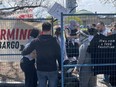 At a border control checkpoint at "Little Gaza" on the University of Toronto campus, marshals inspect and control who can get into the fenced-off anti-Israel city. -- Joe Warmington/Toronto Sun