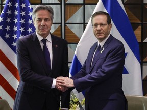 U.S. Secretary of State Antony Blinken (L) meets with Israeli President Isaac Herzog in Tel Aviv, on May 1, 2024. (Photo by Evelyn Hockstein / POOL / AFP)
