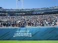 Jacksonville Jaguars fans cheer during an NFL game