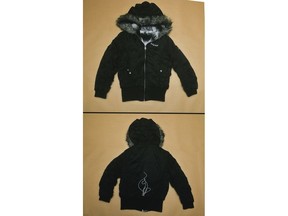 An evidence photo of a Baby Phat branded jacket is shown at a news conference for an ongoing homicide investigation in Winnipeg, Thursday, Dec. 1, 2022.