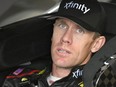 FILE - Carl Edwards sits in the garage during practice for the NASCAR Cup Series auto race at Kansas Speedway in Kansas City, Kan., Oct. 15, 2016. Ricky Rudd, the tough-as-nails driver from Virginia, was selected to the NASCAR Hall of Fame on Tuesday, May 21, 2024, along with Edwards and mechanic and race strategist Ralph Moody, who made it in on the pioneer ballot.