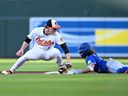 Bo Bichette of the Blue Jays steals second ahead of the tag of Gunnar Henderson of the Baltimore Orioles at Oriole Park at Camden Yards on May 13, 2024.