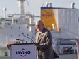 Arthur L. Irving, then chairman of Irving Oil, takes to the podium during the grand opening of the Halifax Harbour Terminal in Dartmouth, N.S., Thursday, Oct. 20, 2016.