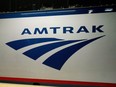 Amtrak says no passenger trains are set to run between Montreal and New York City for at least the next six weeks due to maintenance work after it struck a deal with Canadian National Railway Co. An Amtrak logo is seen on a train at 30th Street Station in Philadelphia, Feb. 6, 2014.