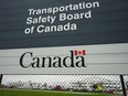 Transportation Safety Board of Canada (TSB) signage is pictured outside TSB offices in Ottawa on Monday, May 1, 2023. A Transportation Safety Board report says a small float plane coming in near Tofino, B.C., either hit a boat wake or an object and then slammed into trees on a second landing attempt.