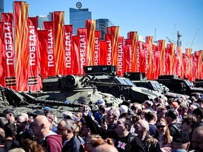 People visit an exhibition showing western military equipment captured by Russian forces in Ukraine, displayed at the WWII memorial complex at Poklonnya Hill western in Moscow, on May 1, 2024. (Photo by Alexander NEMENOV / AFP)