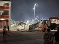 A general view of a collapsed building in George on May 6, 2024. A multi-storey building under construction in South Africa's coastal city of George collapsed on May 6, 2024 trapping workers in the rubble.