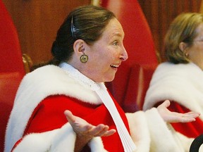 Justice Rosalie Abella gestures during a swearing-in ceremony at the Supreme Court of Canada for her in Ottawa, Monday Oct. 4, 2004.