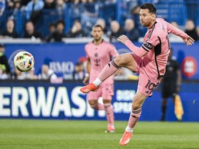 Inter Miami's Lionel Messi passes the ball during MLS soccer action against CF Montreal in Montreal, Saturday, May 11, 2024. Messi continues to lead Major League Soccer, on the field and off, with a league-high $20,446,667 salary (all figures in U.S. dollars) this season.