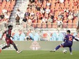 Toronto FC's Deandre Kerr scores on CS Saint Laurent goalkeeper Konstantinos Maniatis during first half Canadian Championship quarterfinal action in Toronto, on Tuesday, May 21, 2024.