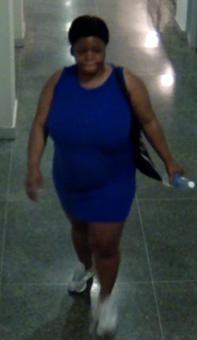 This woman is a suspect in a theft over $5,000 investigation that occurred at a business near Yonge and Grosvenor Sts. on Wednesday, May 22, 2024.