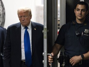 Former President Donald Trump returns to the courthouse moments before hearing that the jury had a verdict in his criminal trial at Manhattan Criminal Court, Thursday, May 30, 2024, in New York.