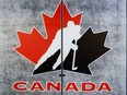 A Hockey Canada logo is seen on the door to a meeting room at the organization's head office in Calgary, Alta., Sunday, Nov. 6, 2022.
