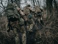 Ukrainian recruits with the Aidar Battalion train in the eastern Donbas region in early February. MUST CREDIT: Wojciech Grzedzinski