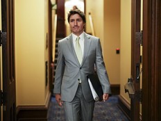 Prime Minister Justin Trudeau makes his way to talk to reporters