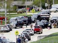 Law enforcement personnel respond to a report of a person armed with a rifle at Mount Horeb Middle School in Mount Horeb, Wis., Wednesday, May 1, 2024.