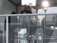 Rory McIlroy hugs Amanda Balionis during an interview at the Canadian Open.