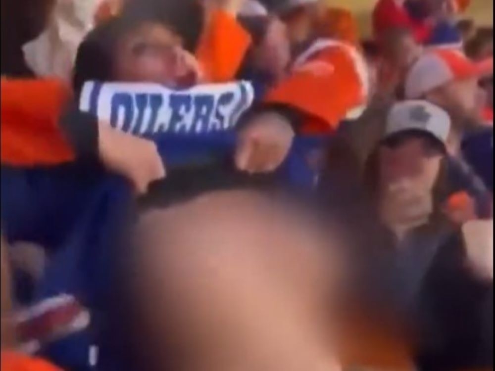 Oilers fan who flashed breasts bares soul instead during interview