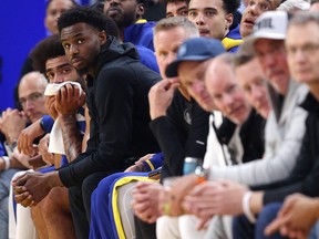 Andrew Wiggins of the Golden State Warriors sits on the bench during their game against the Oklahoma City Thunder.