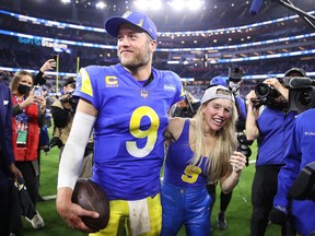 Matthew Stafford of the Los Angeles Rams and wife Kelly react after defeating the San Francisco 49ers in the NFC Championship Game in 2022.