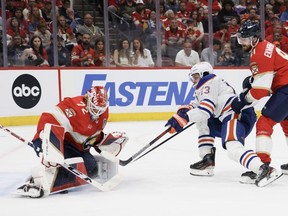 SUNRISE, FLORIDA - JUNE 08: Sergei Bobrovsky #72 of the Florida Panthers makes a save against Mattias Janmark #13 of the Edmonton Oilers during the second period in Game One of the 2024 Stanley Cup Final at Amerant Bank Arena on June 08, 2024 in Sunrise, Florida.
