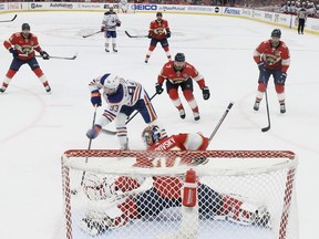 SUNRISE, FLORIDA - JUNE 08: Sergei Bobrovsky #72 of the Florida Panthers makes a save against Ryan Nugent-Hopkins #93 of the Edmonton Oilers in Game One of the 2024 Stanley Cup Final at Amerant Bank Arena on June 08, 2024 in Sunrise, Florida.