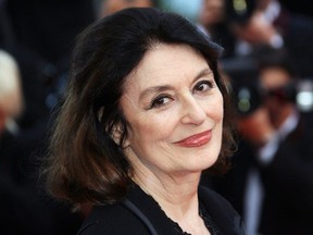 French actress Anouk Aimee poses upon arriving at the Festival Palace to attend the premiere of Mexican director Guillermo del Toro's film 'El Laberinto del Fauno' (Pan's Labyrinth) at the 59th edition of the International Cannes Film Festival in Cannes, southern France, on May 27, 2006.