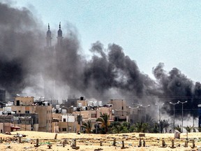 Smoke plumes billow during ongoing battles in Rafah, Gaza Strip.