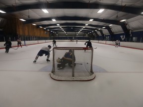 Action on the ice at Moss Park Arena