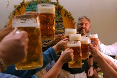 In German beer halls and beer gardens, drinks are served in huge liter glasses (called "ein Mass"). Men's rooms often come with vomitoriums. (photo: Dominic Bonuccelli)