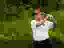Mantan Presiden AS dan calon Presiden 2024 Donald Trump bermain golf selama Turnamen Pro-Am Resmi menjelang acara LIV Golf Invitational Series di Trump National Golf Club Bedminster di Bedminster, New Jersey, pada 10 Agustus 2023.  