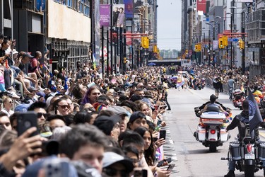 Crowds gather to watch the Toronto Pride Parade.