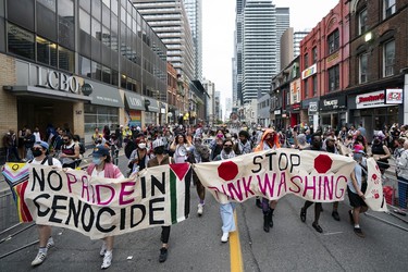Pro Palestinian protesters disrupt the Toronto Pride Parade.