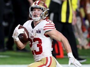 Christian McCaffrey of the San Francisco 49ers runs the ball for a touchdown in the second quarter against the Kansas City Chiefs during Super Bowl LVIII at Allegiant Stadium on Feb. 11, 2024 in Las Vegas.